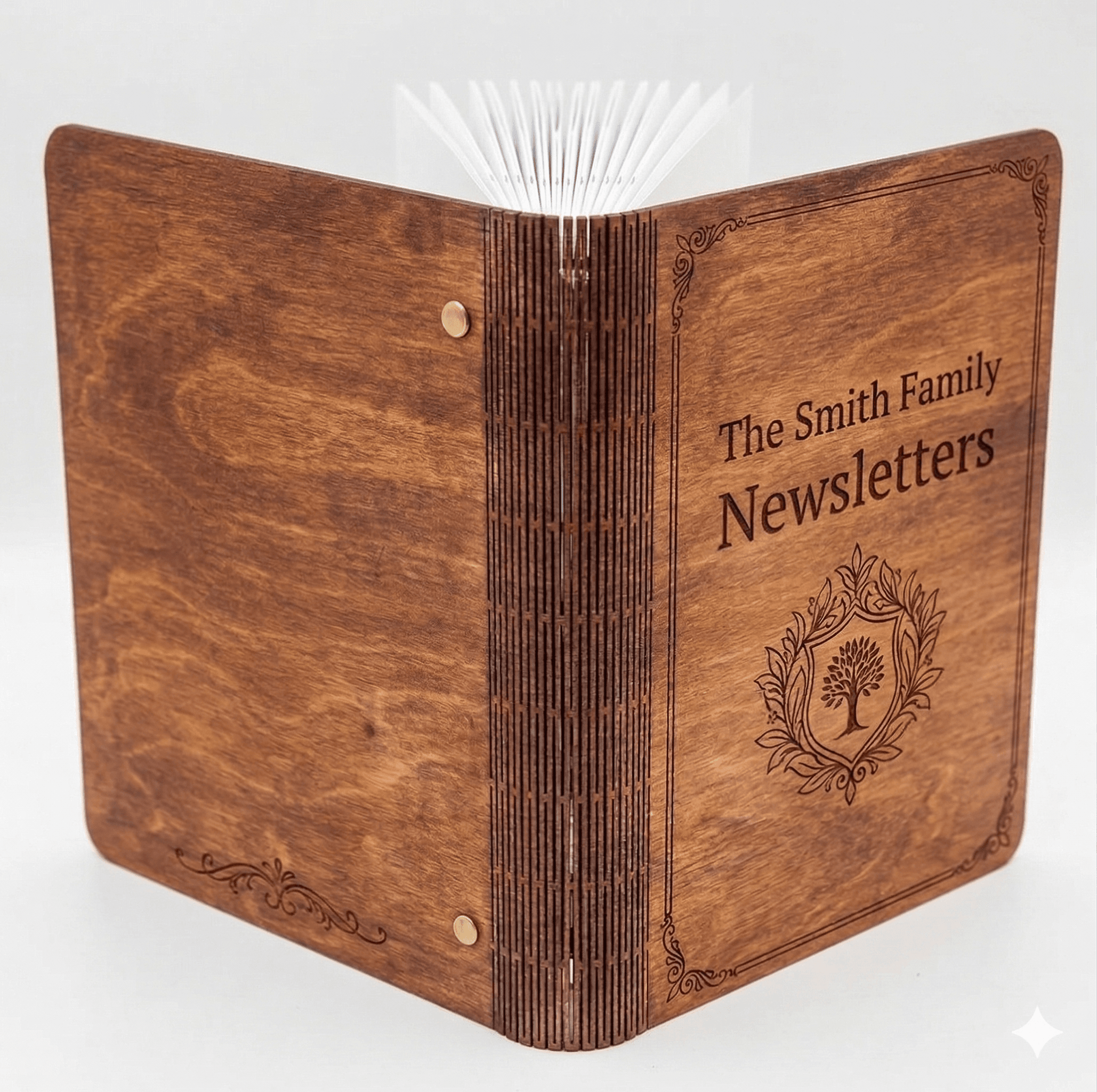 Handmade laser-engraved wooden binder for Family Press newsletters